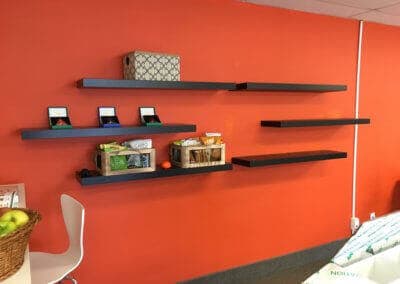 Floating shelves built and installed by SoCal Carpentry in San Diego. These are installed in a commercial office for a local tech startup.