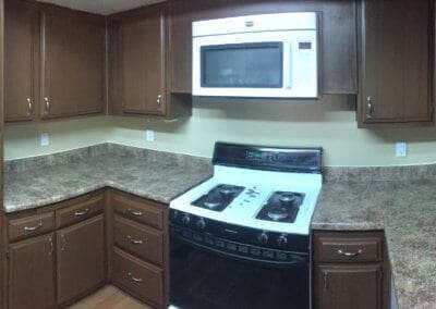Cabinet refacing can change the look of your cabinets while saving a major expense. We refaced these cabinets to a new color, all new hardware and more